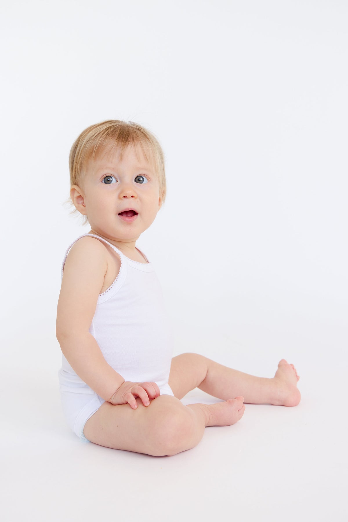 Little Cloud White Bodysuits - 4 Pack